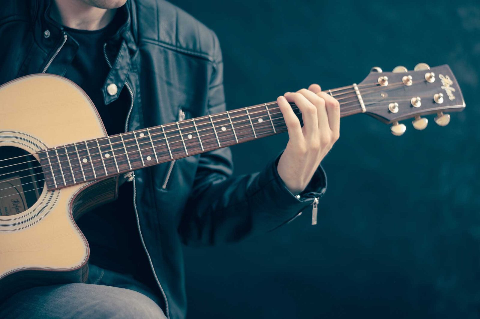 Man playing acustic guitar